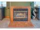 Brick fireplace with glass doors, adding warmth and charm to the room at 6269 Se 125Th Pl, Belleview, FL 34420