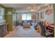 Spacious living room featuring a comfortable sectional sofa and fireplace at 6269 Se 125Th Pl, Belleview, FL 34420