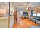 Open floor plan connecting living room and kitchen at 6269 Se 125Th Pl, Belleview, FL 34420