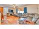 Spacious living room with sectional sofa and built-in fireplace at 6269 Se 125Th Pl, Belleview, FL 34420