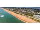 Expansive aerial view of coastline and condo buildings at 3370 Ocean Shore Blvd # 203B, Ormond Beach, FL 32176