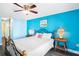 Primary bedroom with a king-size bed and ocean view at 3370 Ocean Shore Blvd # 203B, Ormond Beach, FL 32176
