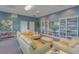 Relaxing community room with comfortable seating and library at 231 Riverside Dr # 2409-1, Holly Hill, FL 32117