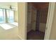 Spacious walk-in closet with custom shelving and ample hanging space at 231 Riverside Dr # 2409-1, Holly Hill, FL 32117
