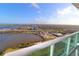 Stunning aerial view showcasing waterfront property, bridges, and cityscape at 231 Riverside Dr # 2409-1, Holly Hill, FL 32117