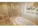 Spa-like bathroom with soaking tub, walk-in shower, and updated fixtures at 231 Riverside Dr # 2409-1, Holly Hill, FL 32117