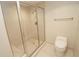 Bathroom with toilet and glass shower at 231 Riverside Dr # 2409-1, Holly Hill, FL 32117