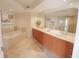 Spa-like bathroom with double vanity and a jetted tub at 231 Riverside Dr # 2409-1, Holly Hill, FL 32117