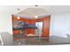 Modern kitchen with stainless steel appliances and granite countertops at 231 Riverside Dr # 2409-1, Holly Hill, FL 32117
