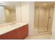 Bathroom with wood vanity and glass shower at 231 Riverside Dr # 2409-1, Holly Hill, FL 32117