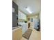 Laundry room with washer, dryer, and cabinets at 3801 S Atlantic Ave # 303, Daytona Beach Shores, FL 32118