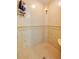 Walk-in shower with tiled walls and floor at 3801 S Atlantic Ave # 303, Daytona Beach Shores, FL 32118