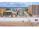 Aerial view of beachfront property, showing building and surrounding beach at 3801 S Atlantic Ave # 303, Daytona Beach Shores, FL 32118