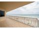 Balcony with full ocean view and white railings at 3801 S Atlantic Ave # 303, Daytona Beach Shores, FL 32118