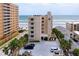 Exterior view of the building near the beach at 3801 S Atlantic Ave # 303, Daytona Beach Shores, FL 32118