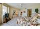Main bedroom with king-size bed and access to bathroom at 3801 S Atlantic Ave # 303, Daytona Beach Shores, FL 32118