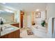 Double vanity bathroom with large soaking tub and shower at 3801 S Atlantic Ave # 303, Daytona Beach Shores, FL 32118
