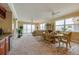 Ocean view dining room with a large table and chairs at 3801 S Atlantic Ave # 303, Daytona Beach Shores, FL 32118