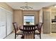 Ocean view dining area with round table and chairs at 1183 Ocean Shore Blvd # 5050, Ormond Beach, FL 32176