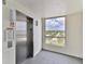 Hallway with elevator and ocean view window at 1183 Ocean Shore Blvd # 5050, Ormond Beach, FL 32176