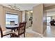 Bright dining area with ocean view and table for four at 1183 Ocean Shore Blvd # 5050, Ormond Beach, FL 32176