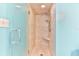 Large walk-in shower with tiled walls at 1183 Ocean Shore Blvd # 5050, Ormond Beach, FL 32176