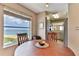 Round table and chairs in a dining area with ocean view at 1183 Ocean Shore Blvd # 5050, Ormond Beach, FL 32176