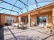 Spacious covered patio with seating area, perfect for outdoor dining at 112 Sevilla Ct, Poinciana, FL 34759