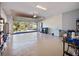 Large garage with ample storage shelving and space for vehicles at 112 Sevilla Ct, Poinciana, FL 34759