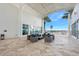 Relaxing outdoor patio with seating area and water views at 231 Riverside Dr # 1106-1, Holly Hill, FL 32117