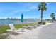 Enjoy the sun on the lounge chairs near the water at 231 Riverside Dr # 1106-1, Holly Hill, FL 32117
