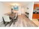 Large dining room with a spacious table and chairs, offering an open feel at 231 Riverside Dr # 1106-1, Holly Hill, FL 32117
