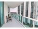Spacious balcony with city views and seating for two at 231 Riverside Dr # 1106-1, Holly Hill, FL 32117