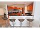 Breakfast bar with three barstools at 231 Riverside Dr # 1106-1, Holly Hill, FL 32117