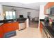 Modern kitchen with granite countertops and stainless steel appliances at 231 Riverside Dr # 1106-1, Holly Hill, FL 32117