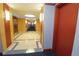 Building hallway with modern flooring and lighting at 231 Riverside Dr # 1106-1, Holly Hill, FL 32117