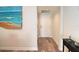 Condo hallway with light walls and wood-look floors at 231 Riverside Dr # 1106-1, Holly Hill, FL 32117