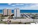 Oceanfront view of two buildings with parking and beach access at 1415 Ocean Shore Blvd # 1112, Ormond Beach, FL 32176