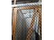 Secure storage unit with wire mesh enclosure and shelving at 1415 Ocean Shore Blvd # 1112, Ormond Beach, FL 32176