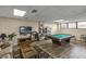 Well-equipped game room featuring a pool table and seating at 1415 Ocean Shore Blvd # 1112, Ormond Beach, FL 32176