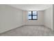Bedroom with ocean view and carpeted floor at 1415 Ocean Shore Blvd # 1112, Ormond Beach, FL 32176