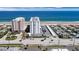 Oceanfront view of two buildings and parking lot at 1415 Ocean Shore Blvd # 1112, Ormond Beach, FL 32176