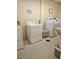 Shared laundry facility with coin-operated washers and dryers at 1415 Ocean Shore Blvd # 1112, Ormond Beach, FL 32176