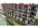 Exterior view of condo building showcasing multiple balconies and ocean proximity at 1433 N Atlantic Ave # 422, Daytona Beach, FL 32118