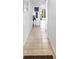 Bright hallway with tile flooring and tasteful wall decor at 1433 N Atlantic Ave # 422, Daytona Beach, FL 32118