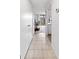 Clean hallway with tile floor leading to living area at 1433 N Atlantic Ave # 422, Daytona Beach, FL 32118
