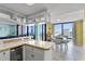Condo kitchen opens to dining area with ocean view at 1239 Ocean Shore Blvd # 7E5, Ormond Beach, FL 32176