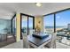 Bright dining area with ocean view and white table at 1239 Ocean Shore Blvd # 7E5, Ormond Beach, FL 32176