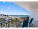 Stunning ocean view from a condo balcony, with chairs to enjoy the scenery at 1239 Ocean Shore Blvd # 7E5, Ormond Beach, FL 32176