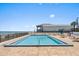 Inviting pool area with ocean view at 1239 Ocean Shore Blvd # 7E5, Ormond Beach, FL 32176